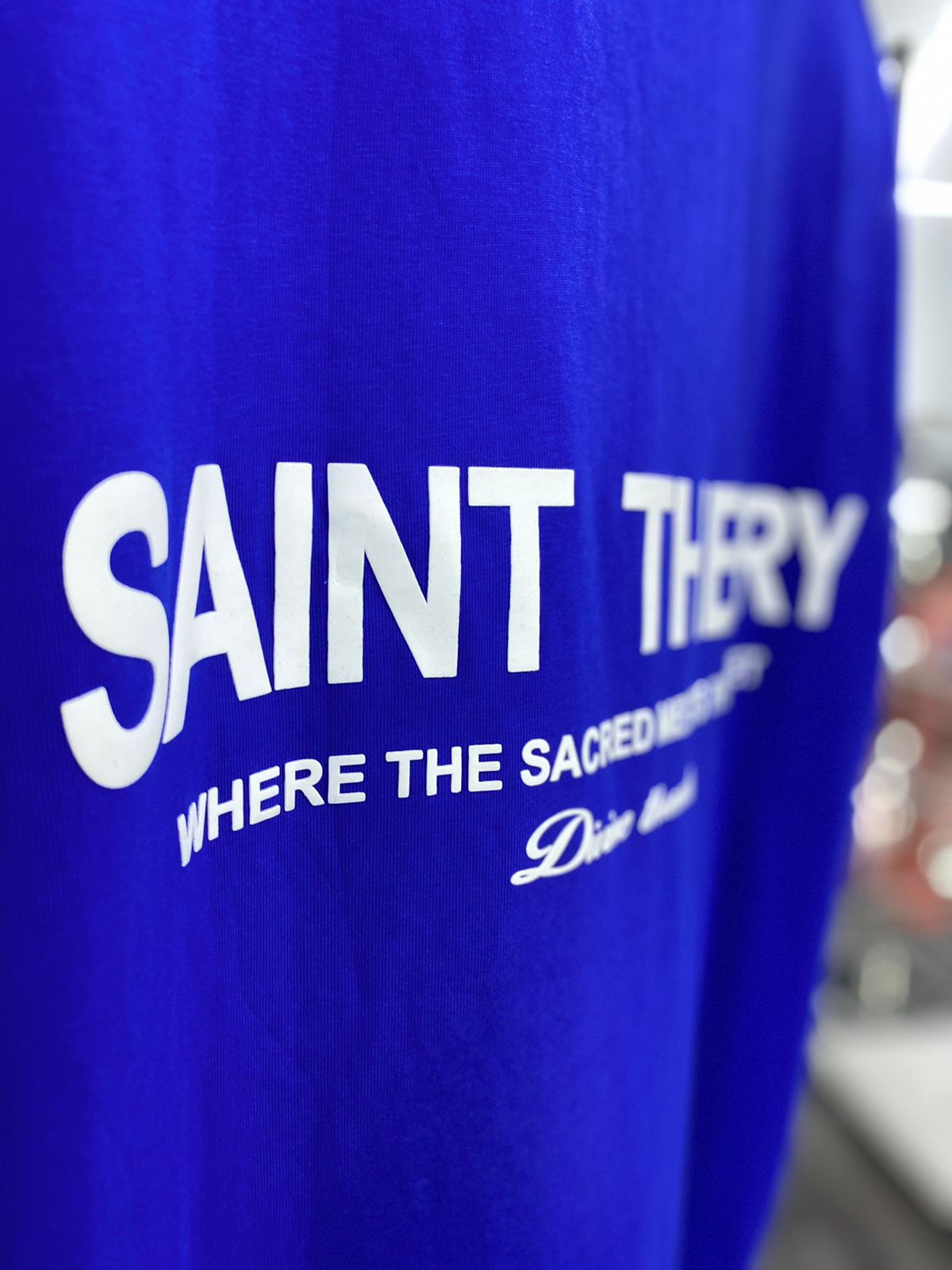 SAINT THEORY HILOS DIVINOS T-SHIRT AZUL DESVANECIDO LETRA BLANCA